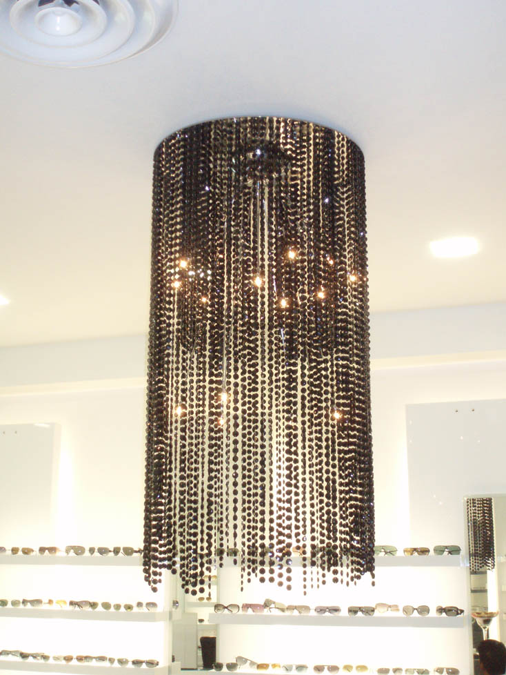 illuminazione lampadario negozi di ottica